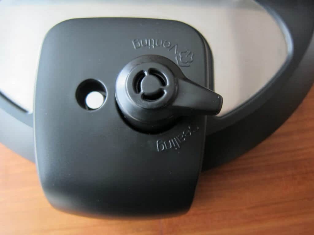 Instant Pot lid with steam release handle set to 'Sealing'