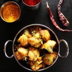 Instant Pot Aloo Gobi | Indian Cauliflower with Potatoes in a bowl with spices in background