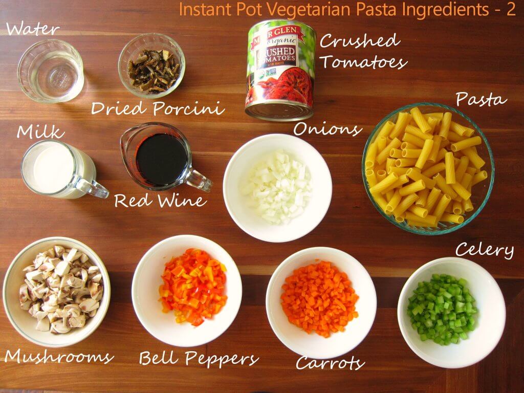 Instant Pot Vegetarian Pasta Ingredients continued (water, porcini, crushed tomatoes, milk, red wine, onions, pasta, mushrooms, bell peppers, carrots, celery- Paint the Kitchen Red