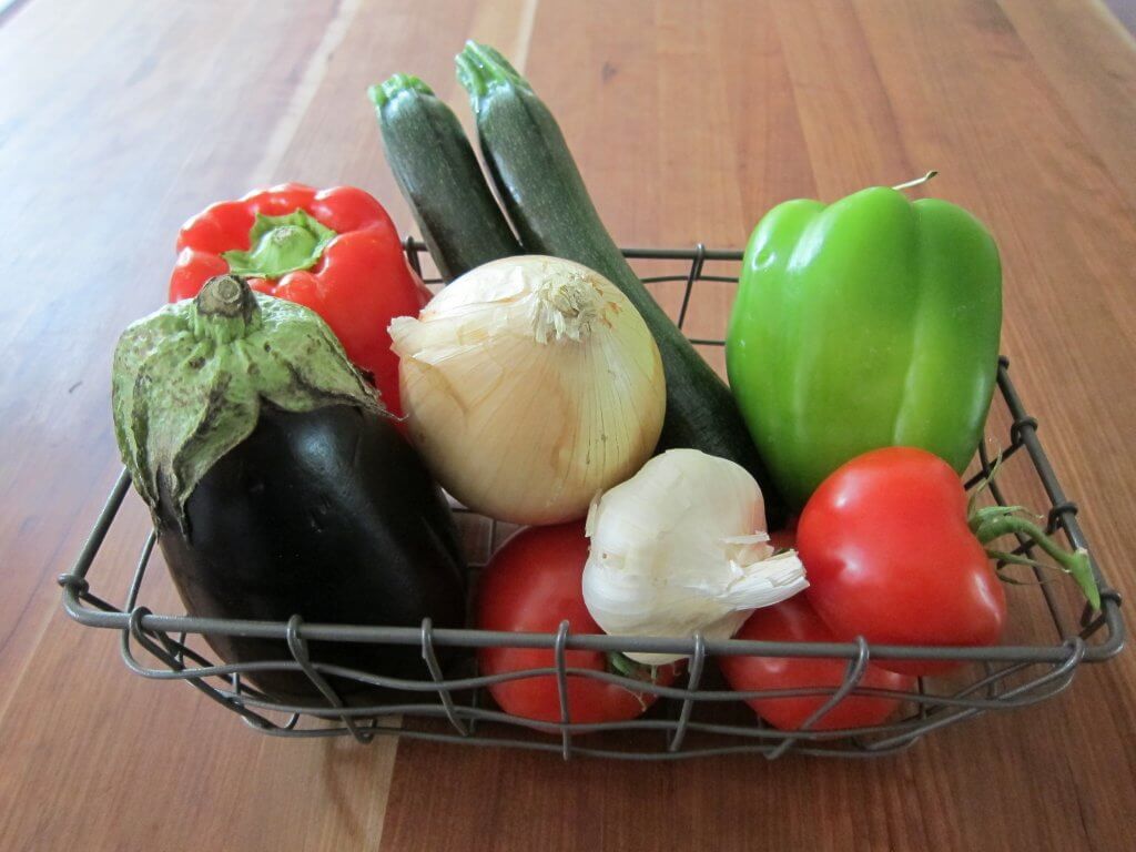 Instant Pot Ratatouille - basket with eggplant, bell pepper, zucchini, onions, garlic