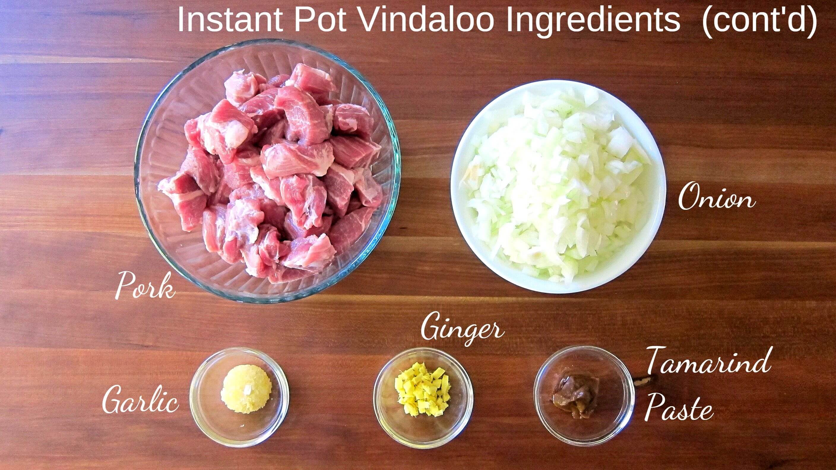 Instant Pot Vindaloo ingredients - pork, onions, garlic, ginger, tamarind paste