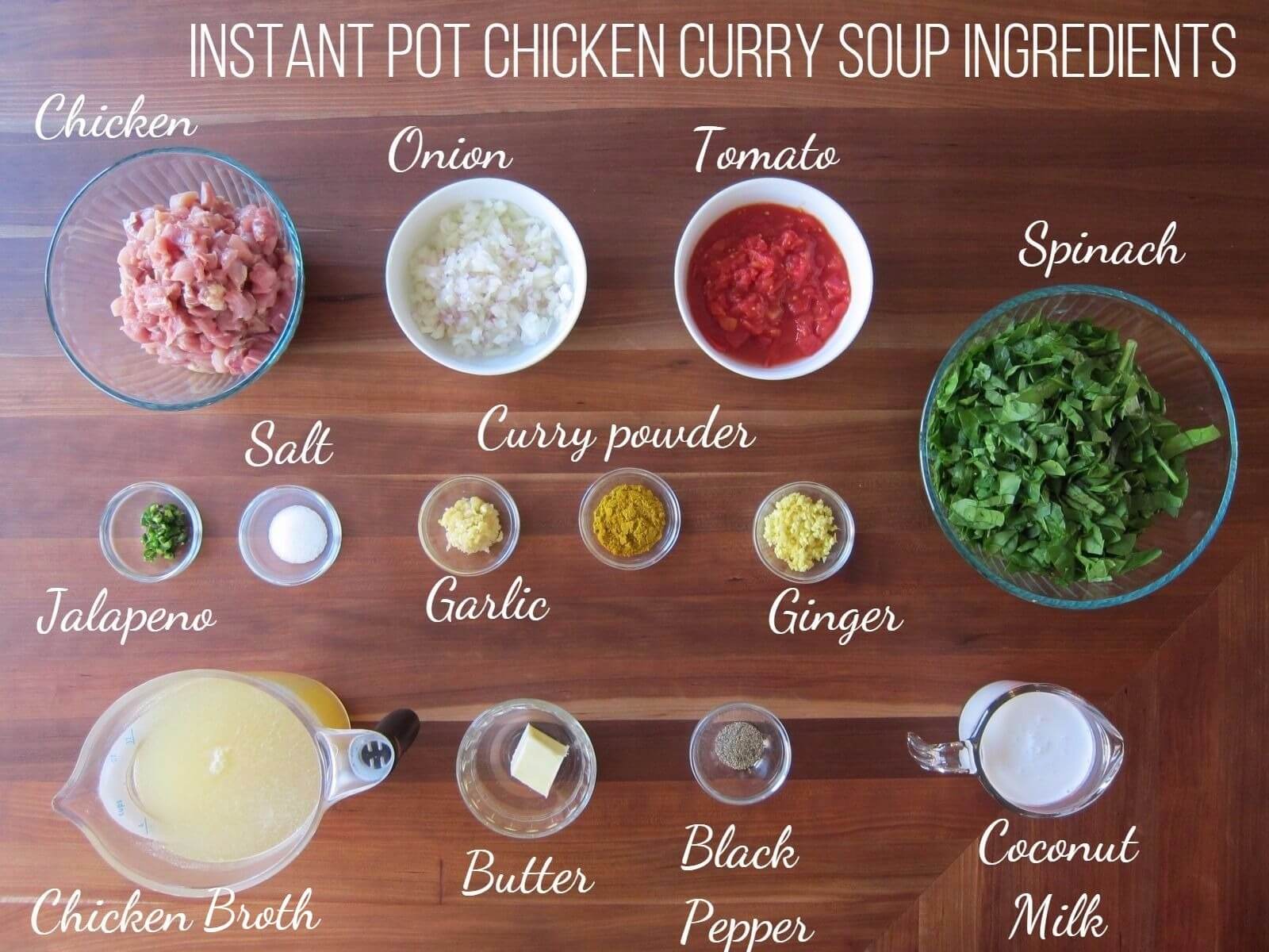 Instant Pot Chicken Curry Soup Ingredients - chicken, onion, tomato, spinach, jalapeno, salt, garlic, curry powder, ginger, chicken broth, butter, black pepper, coconut milk