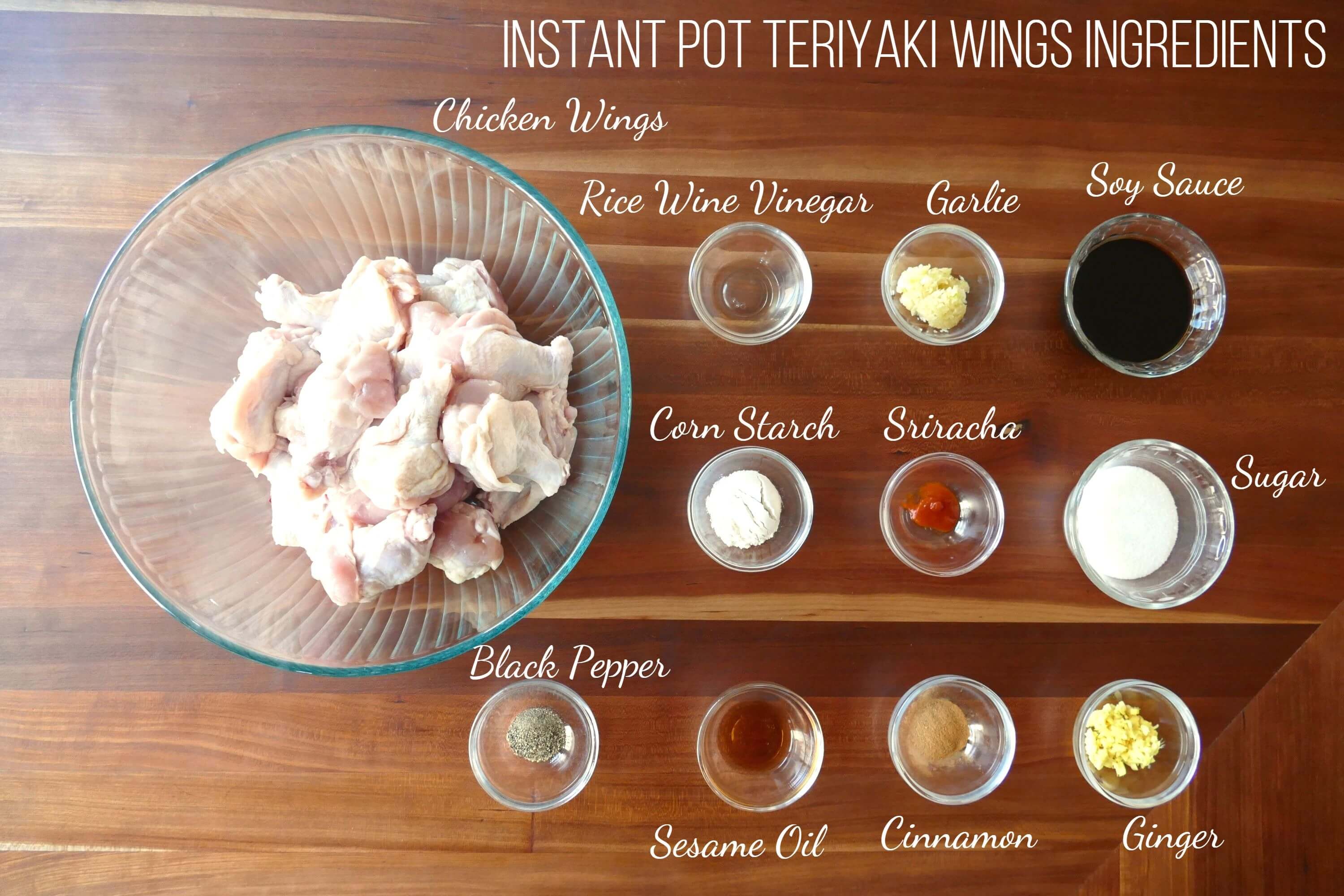 Instant Pot Teriyaki wings ingredients - wings, rice wine vinegar, garlic, soy sauce, cornstarch, sriracha, sugar, black pepper, sesame oil, cinnamon, ginger