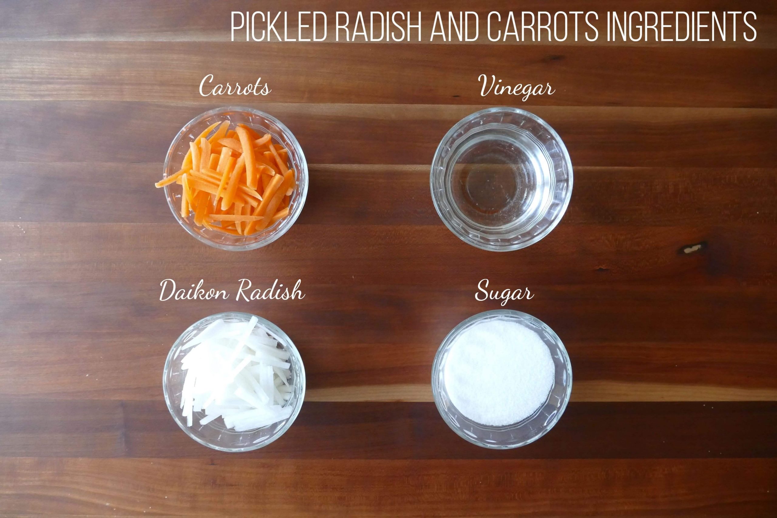 Pickled Daikon and Carrots Ingredients - carrots, vinegar, daikon radish, sugar - Paint the Kitchen Red