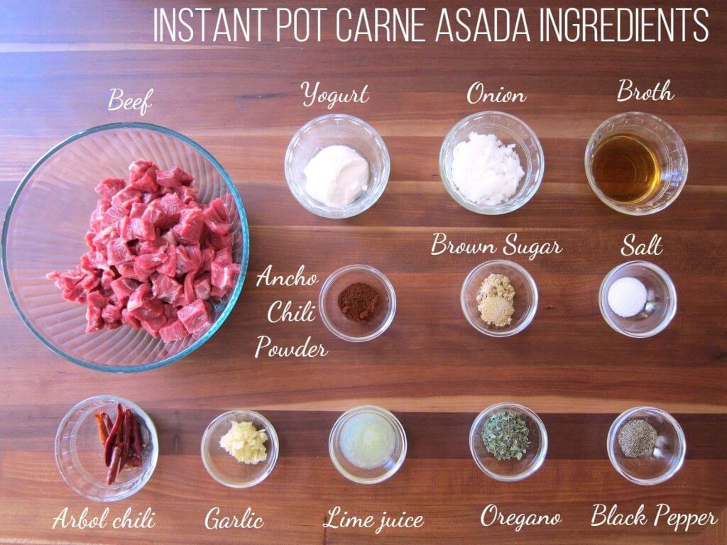 Instant Pot Carne Asada Ingredients - Beef, yogurt, onion, broth, ancho chili powder, brown sugar, salt, arbol chili, garlic, lime juice, oregano, black pepper - Paint the Kitchen Red