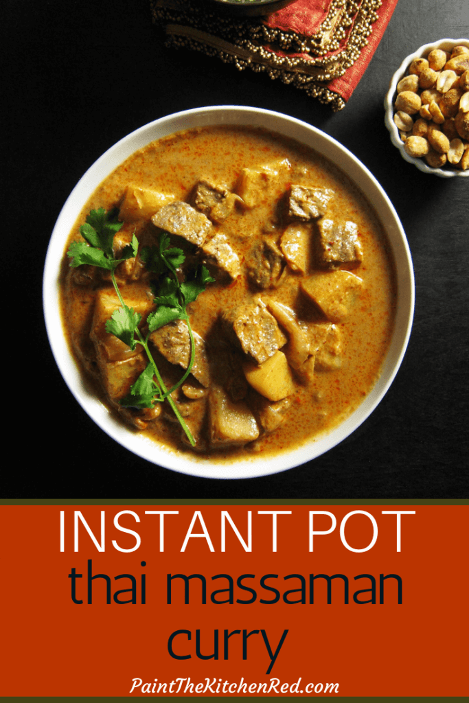 Instant Pot Massaman Curry Pinterest pin with Beef, potatoes, garnished with cilantro in white bowl with peanuts in background - Paint the Kitchen Red
