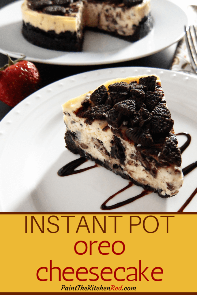 Instant Pot Oreo Cheesecake Pinterest pin with a slice of cheesecake and a whole cheesecake in the background - Paint the Kitchen Red