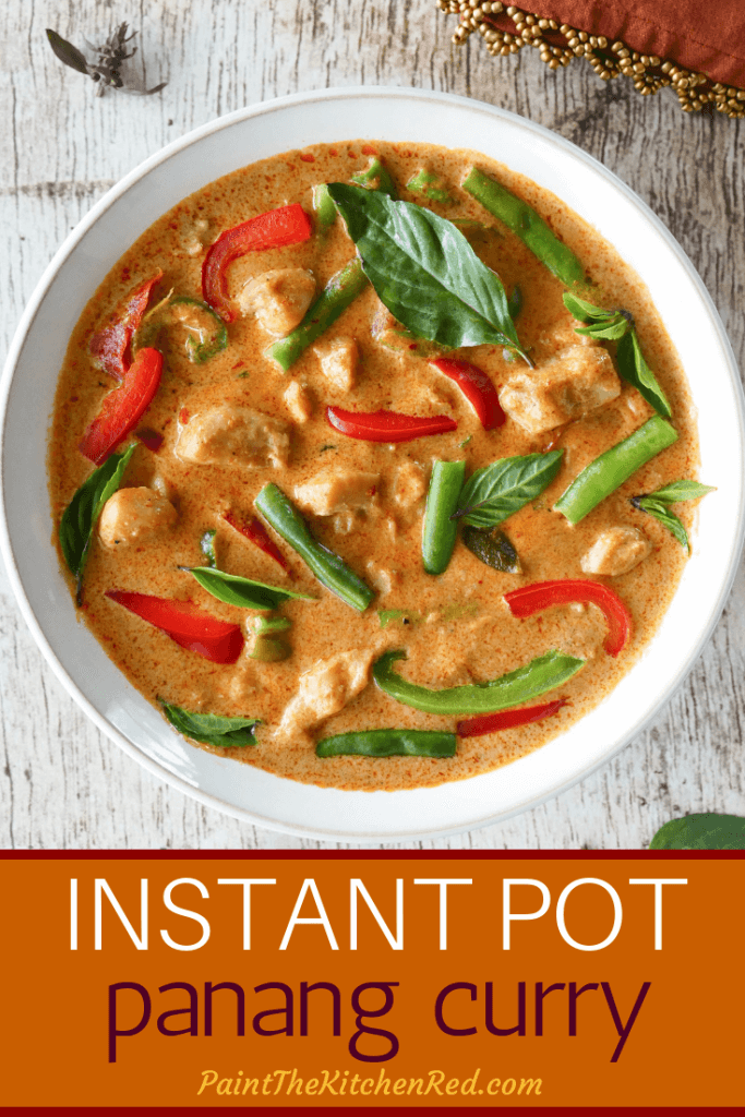 Instant Pot Panang Curry Pinterest pin - panang curry in white bowl with basil garnish - Paint the Kitchen Red