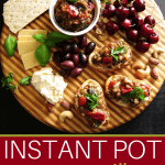 Instant Pot Ratatouille Pinterest pin - on crostini with cheese, nuts, olives, cherries, basil leaves on a dark background - Paint the Kitchen Red