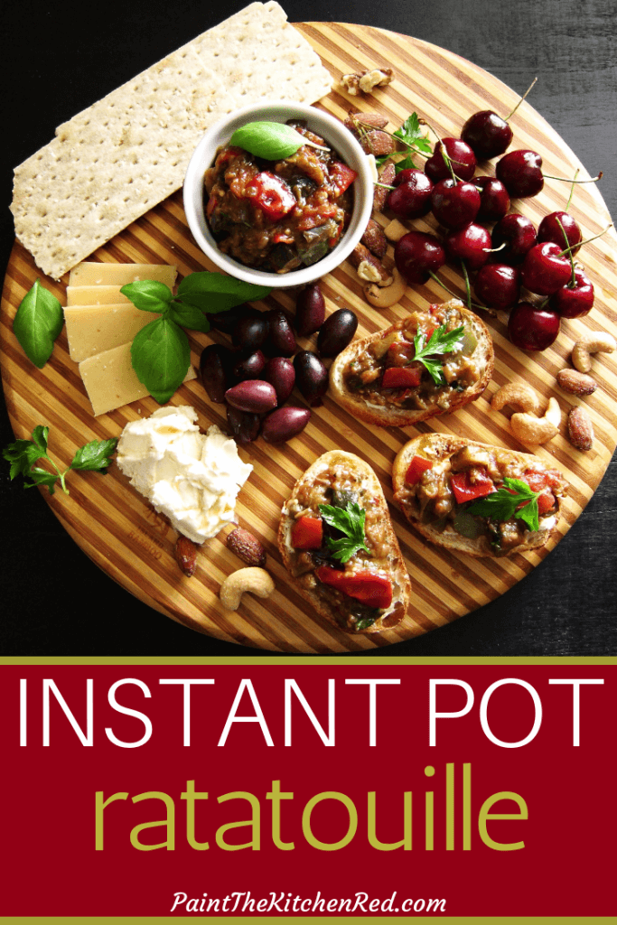 Instant Pot Ratatouille Pinterest pin - on crostini with cheese, nuts, olives, cherries, basil leaves on a dark background - Paint the Kitchen Red