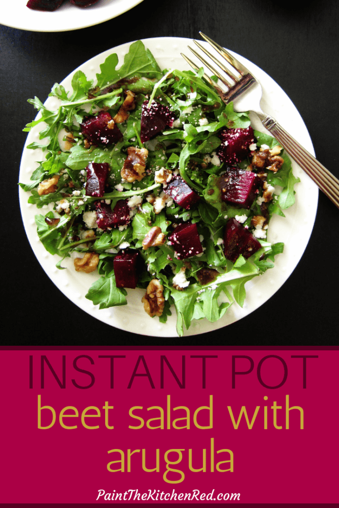 Instant Pot Beet Salad with Arugula Pinterest - salad on plate topped with walnuts and goat cheese - Paint the Kitchen Red