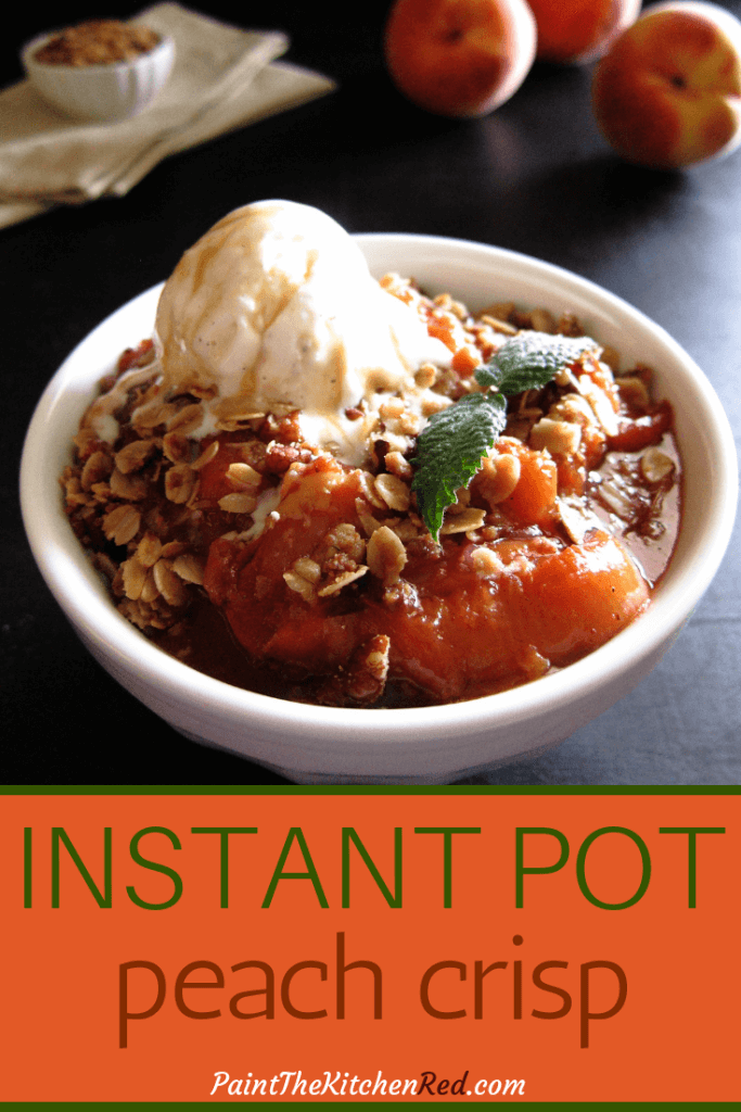 Instant Pot Peach Crisp Pinterest pin - bowl of peach crisp topped with ice cream and a mint leaf - Paint the Kitchen Red
