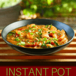 Instant Pot Shrimp Etouffee Pinterest - bowl of shrimp etouffee garnished with green onions and parsley - Paint the Kitchen Red