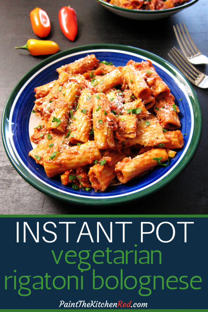 Instant Pot Rigatoni Bolognese Pinterest - bowl of rigatoni and sauce garnished with parmesan and parsley - Paint the Kitchen Red