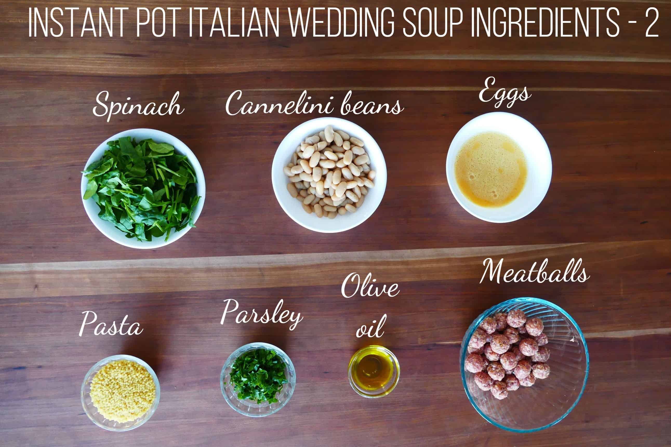 Instant Pot Italian Wedding Soup Ingredients 2 - spinach, cannelini beans, eggs, pasta, parsley, olive oil, meatballs - Paint the Kitchen Red