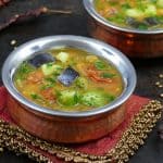 Instant Pot Sambar L1 - two bowls of sambar with tomatoes, eggplant okra, garnished with cilantro