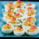 Wasabi Instant Pot Deviled Eggs with wasabi and pickled ginger on colorful blue plate - Paint the Kitchen Red