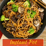Instant Pot Lo Mein with Beef and Broccoli in black bowl on straw mat with chopsticks laid across bowl Pinterest pin - Paint the Kitchen Red