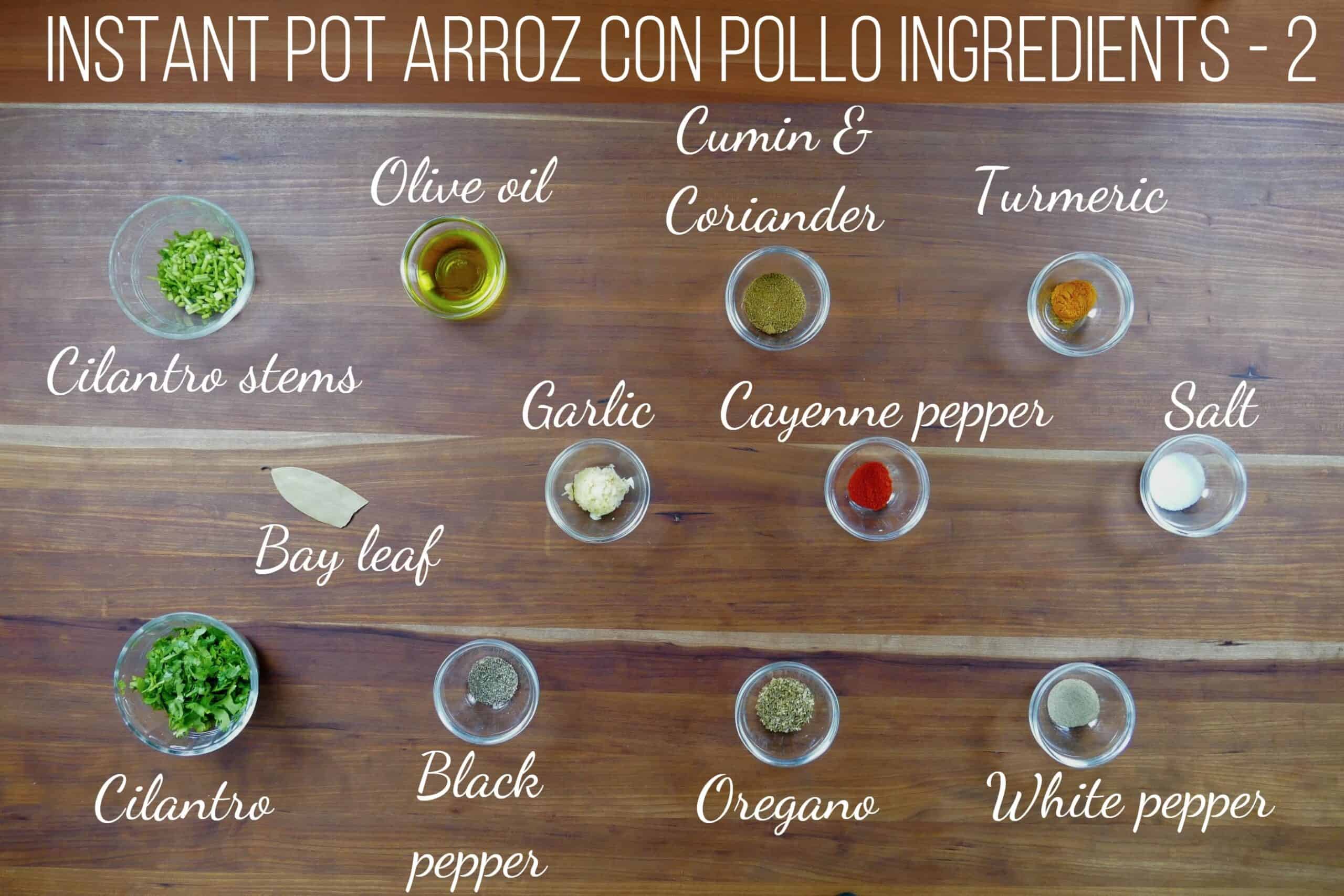 instant pot arroz con pollo ingredients - cilantro stems, olive oil, cumin & coriander, turmeric, bay leaf, garlic, cayenne pepper, salt, cilantro, black pepper, oregano, white pepper - Paint the Kitchen Red