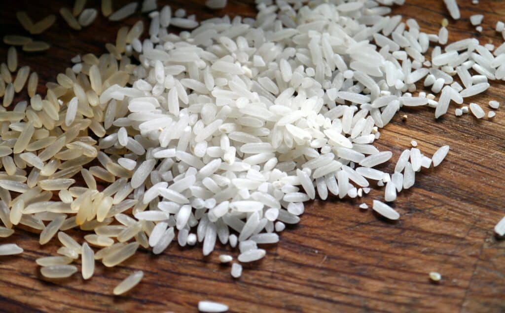 brown and white rice on board