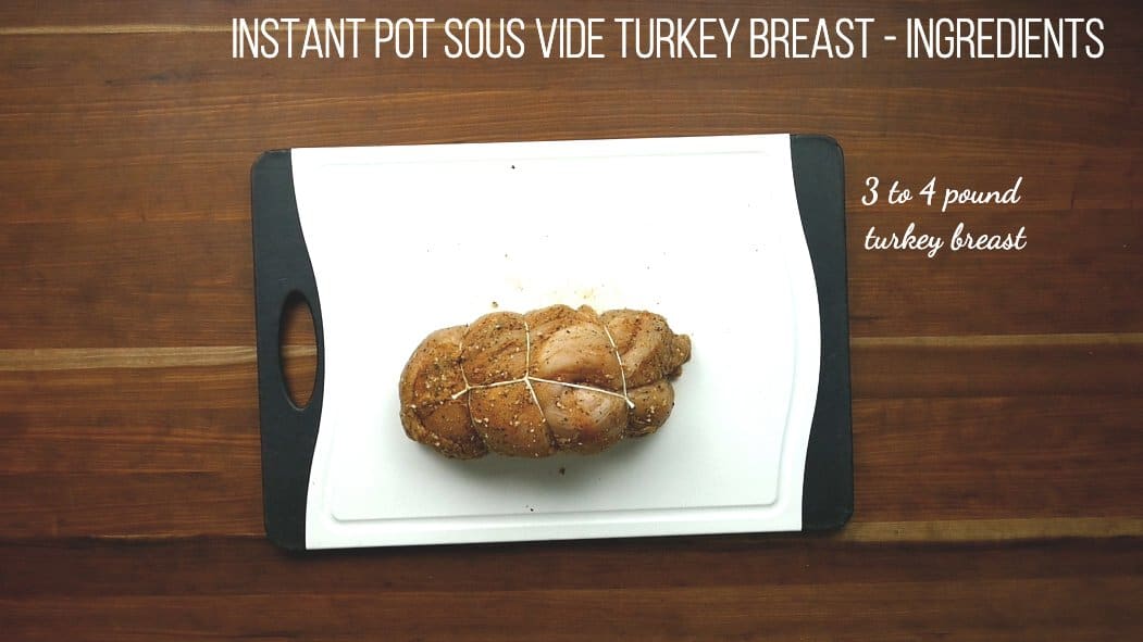 Instant Pot Sous Vide Turkey Breast Ingredients - 3 to 4 pound turkey breast tied with twine, on a cutting board