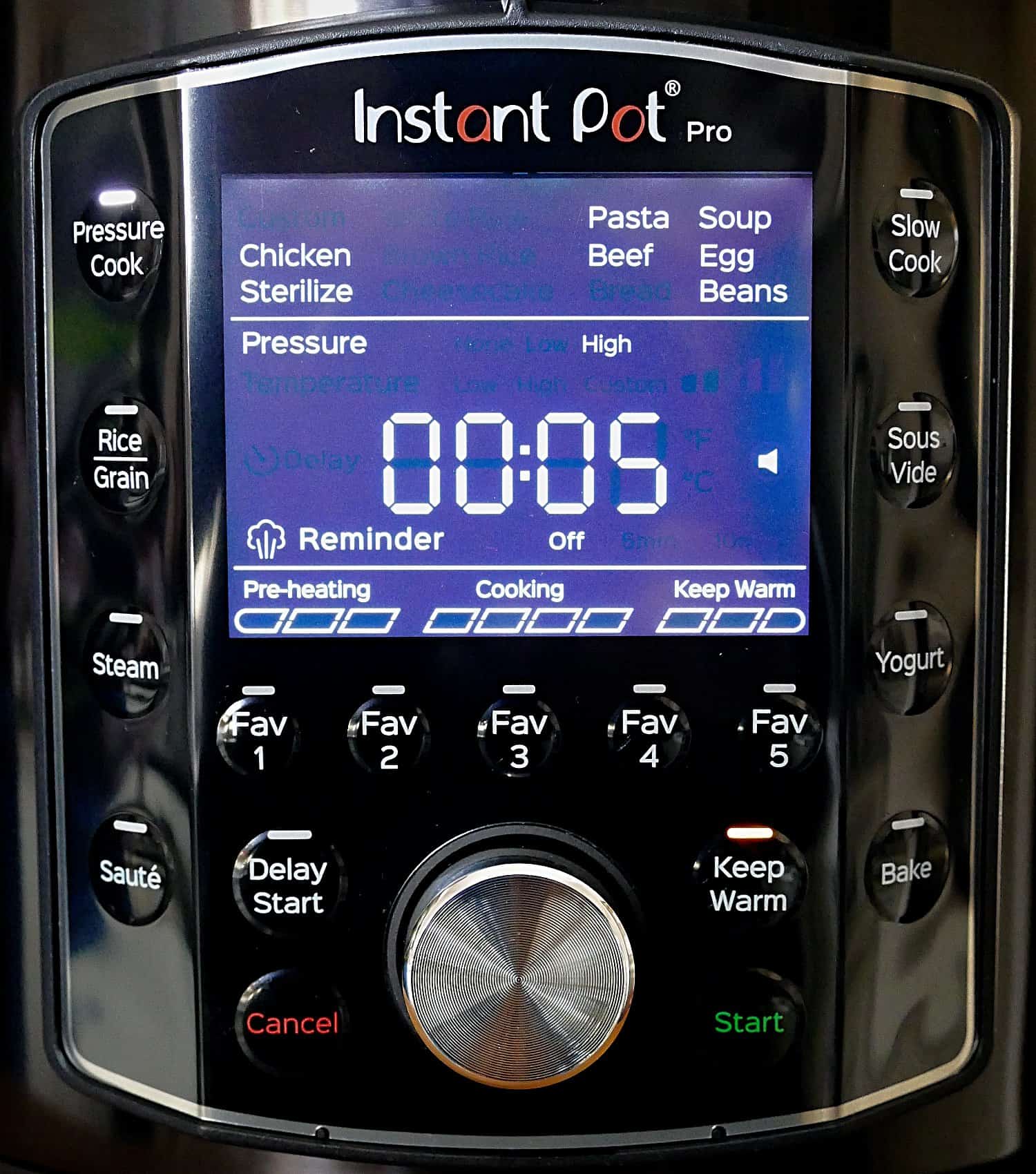 Instant Pot Pro display panel says 00:05 with pressure cook button lit up