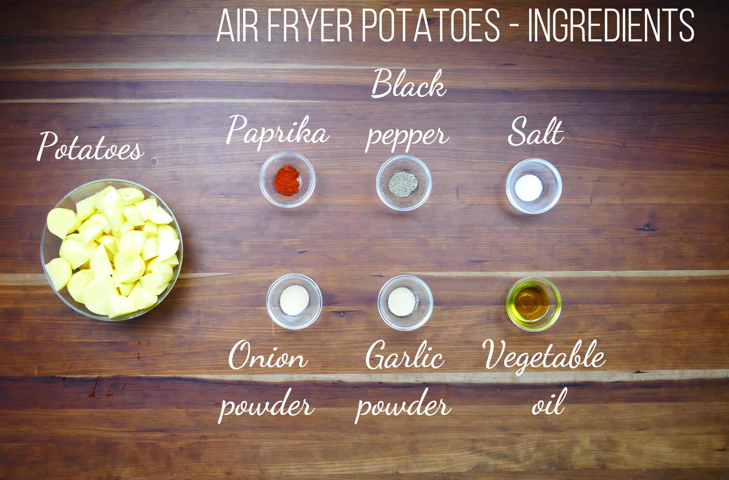 air fryer potatoes ingredients - potatoes, paprika, black pepper, salt, onion powder, garlic powder, vegetable oil