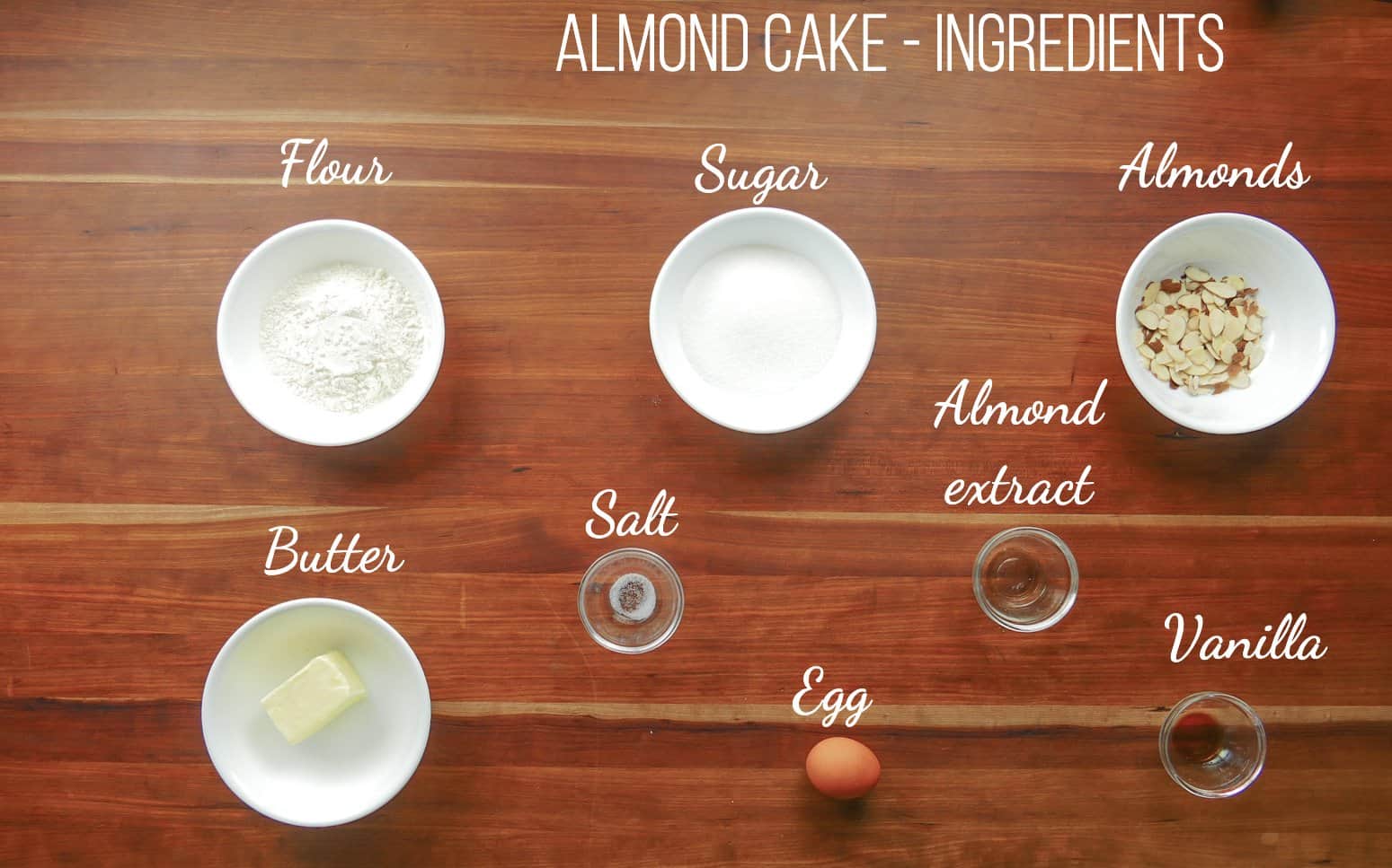 Almond cake - ingredients - flour, sugar, almonds, butter, salt, almond extract, egg, vanilla