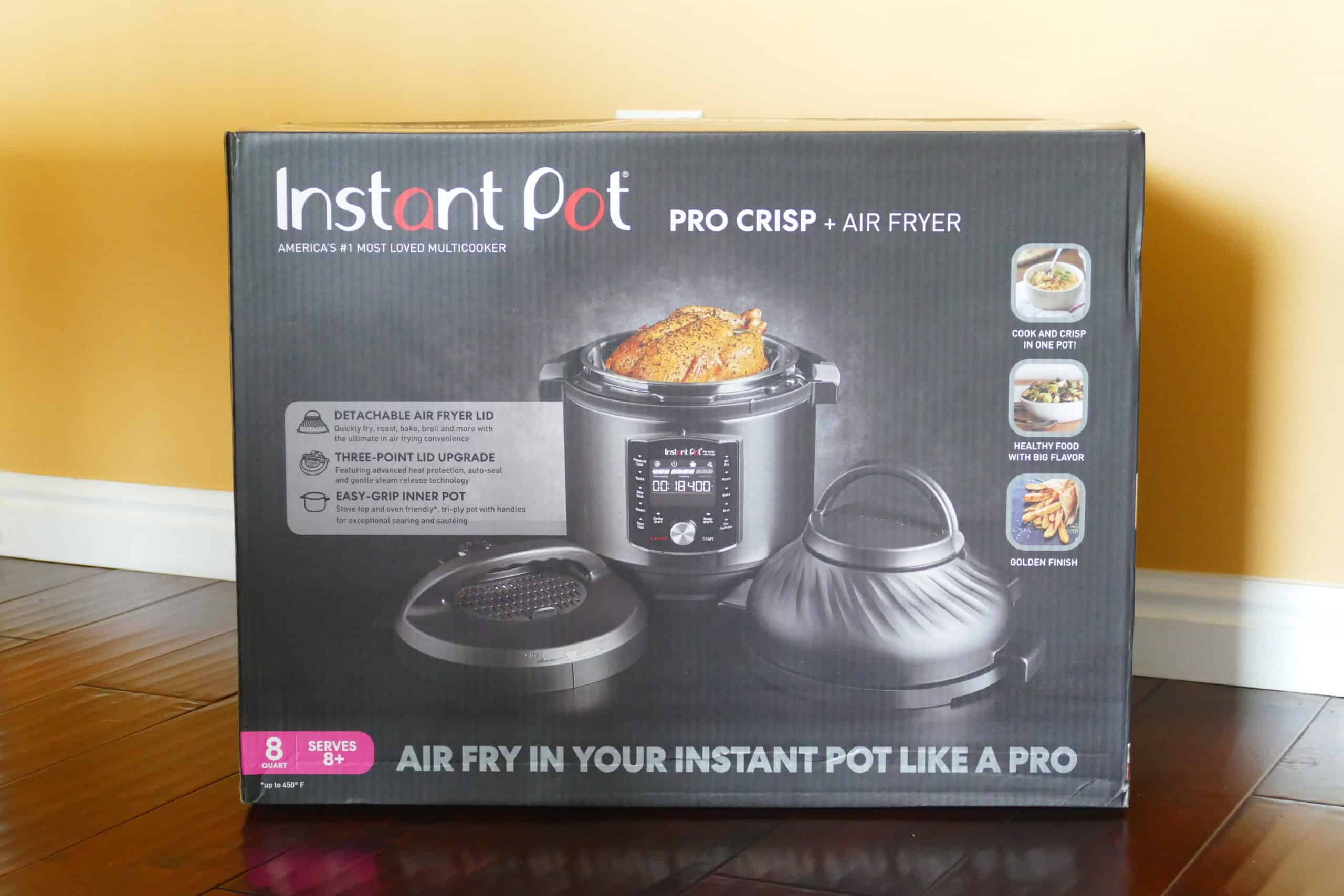 Instant Pot Pro Crisp plus air fryer in a box on the floor