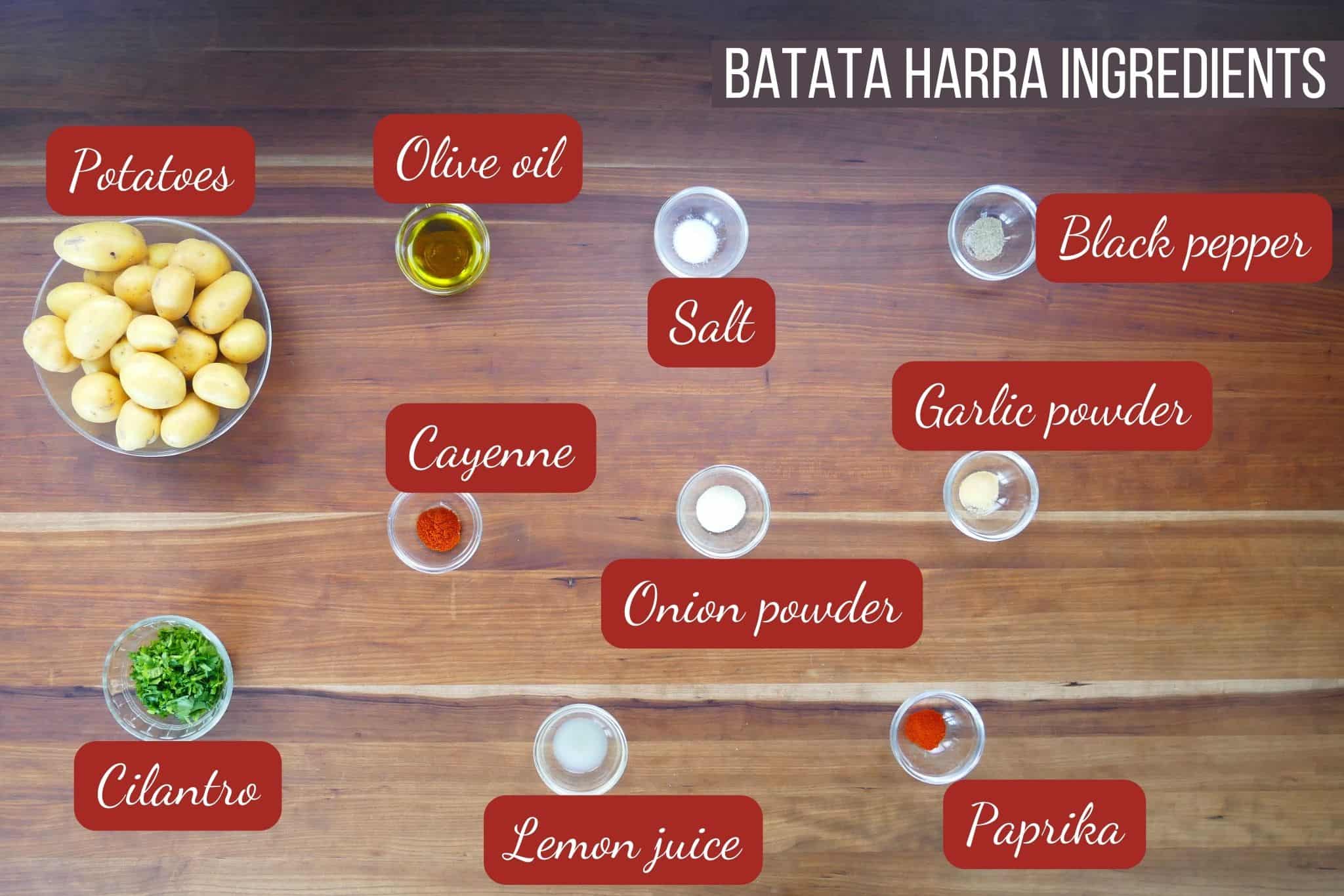 Batata Harra Ingredients - potatoes, olive oil, salt, black pepper, cayenne onion powder, garlic powder, cilantro, lemon juice, paprika