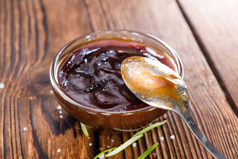 A1 steak sauce on rustic wooden background