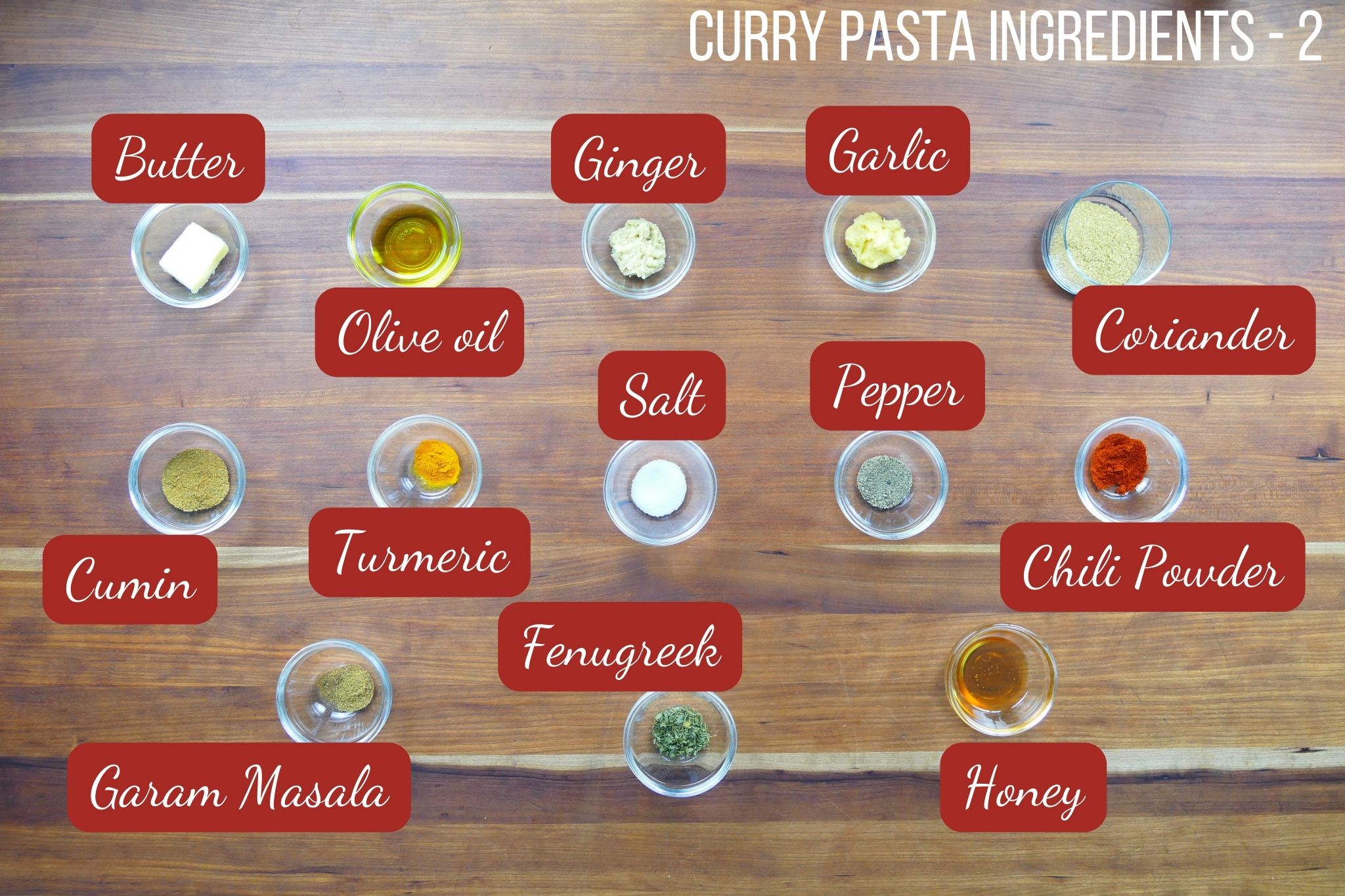 Curry pasta ingredients list part 2 - butter, olive oil, ginger, garlic, coriander, cumin, turmeric, salt, pepper, chili, garam masala, fenugreek, honey