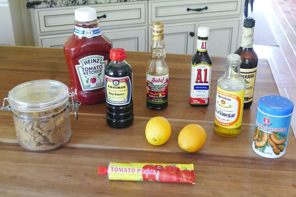 Tamarind paste substitute candidates on a wooden countertop.