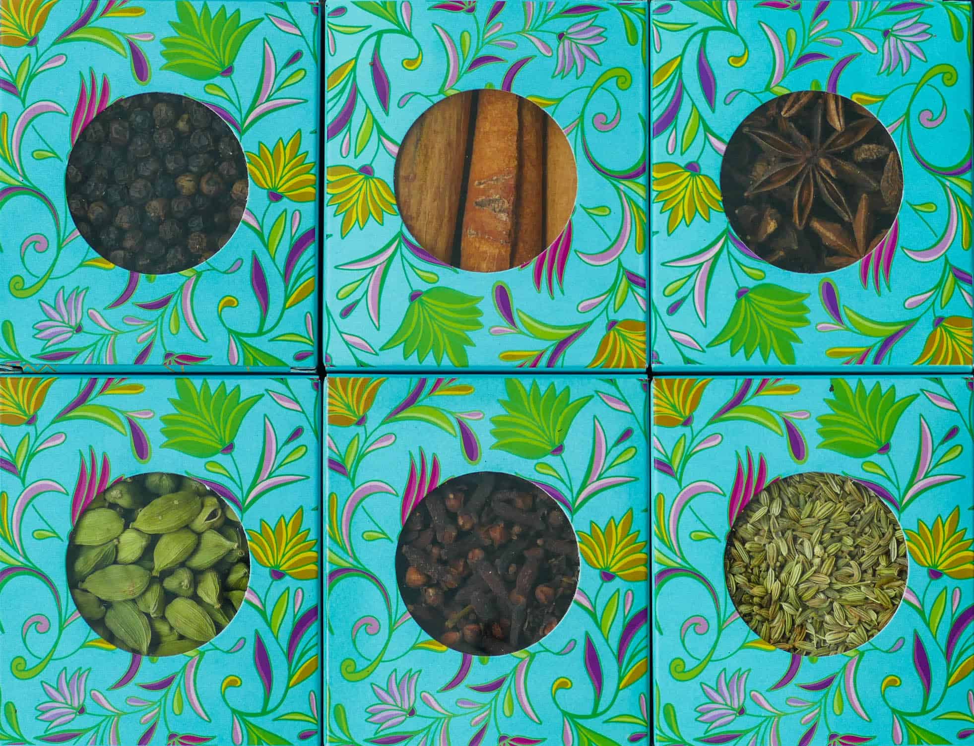 Garam masala ingredients in colorful boxes