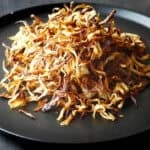 Fried onions on plate.