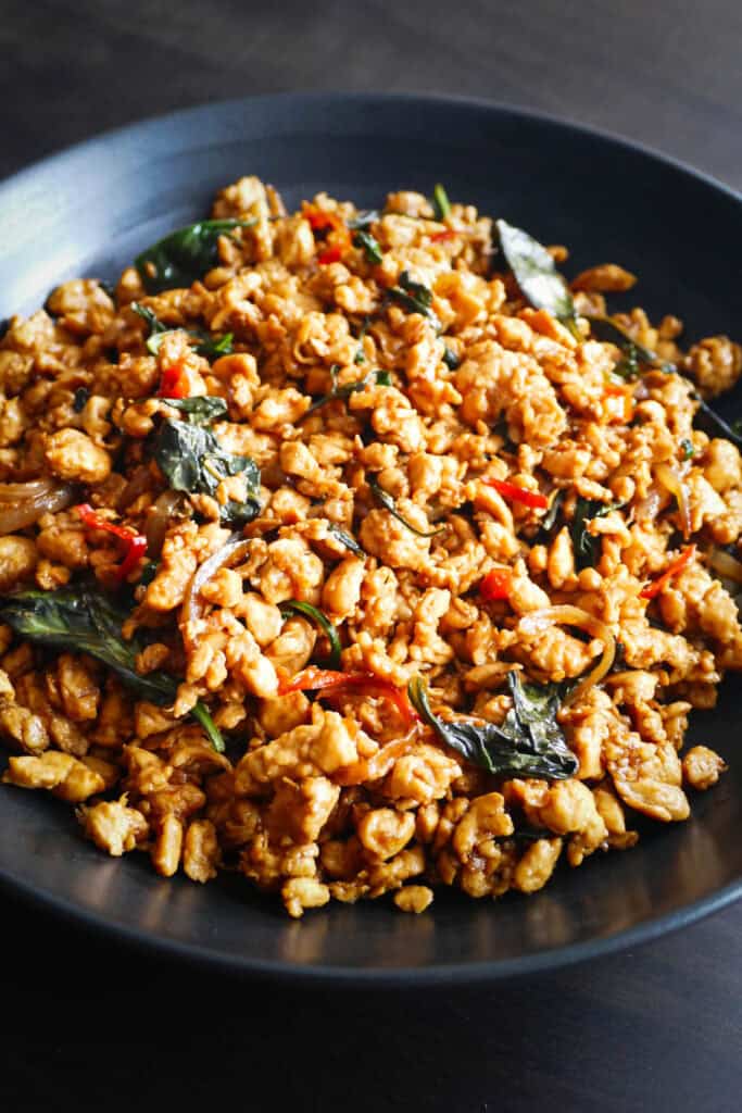 Thai basil chicken in a bowl.