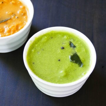 Coconut green chutney in white bowl.