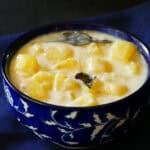 Kerala Potato stew in blue bowl.