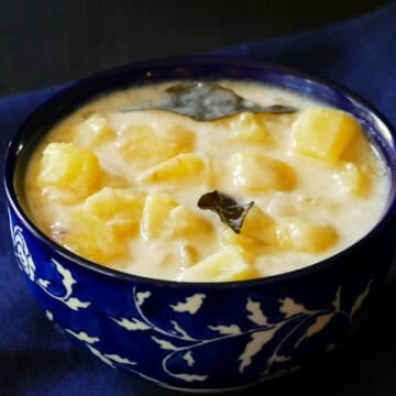 Kerala Potato stew in blue bowl.