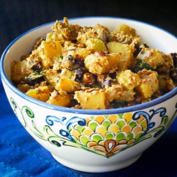 Bowl of Kerala Kootu Curry with black chickpeas.