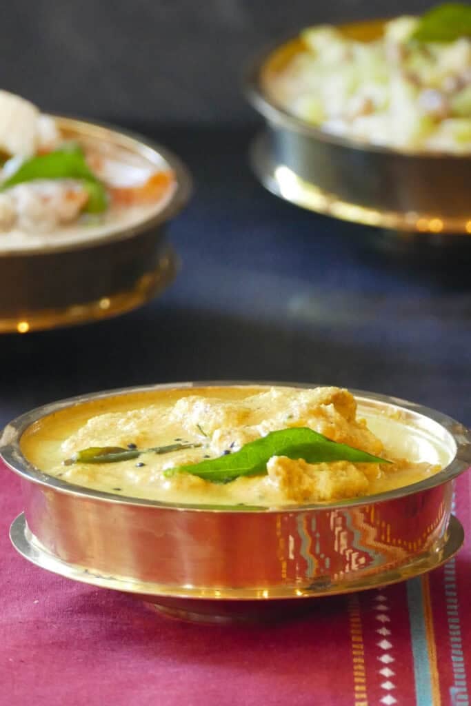 Mango pachadi in brass bowl.