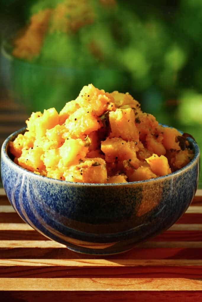 Potato masala in blue bowl.