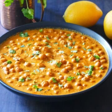 Chickpea Tikka Masala in black bowl.