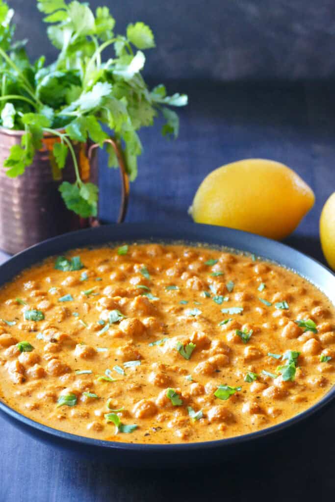 Chickpea Tikka Masala in black bowl.
