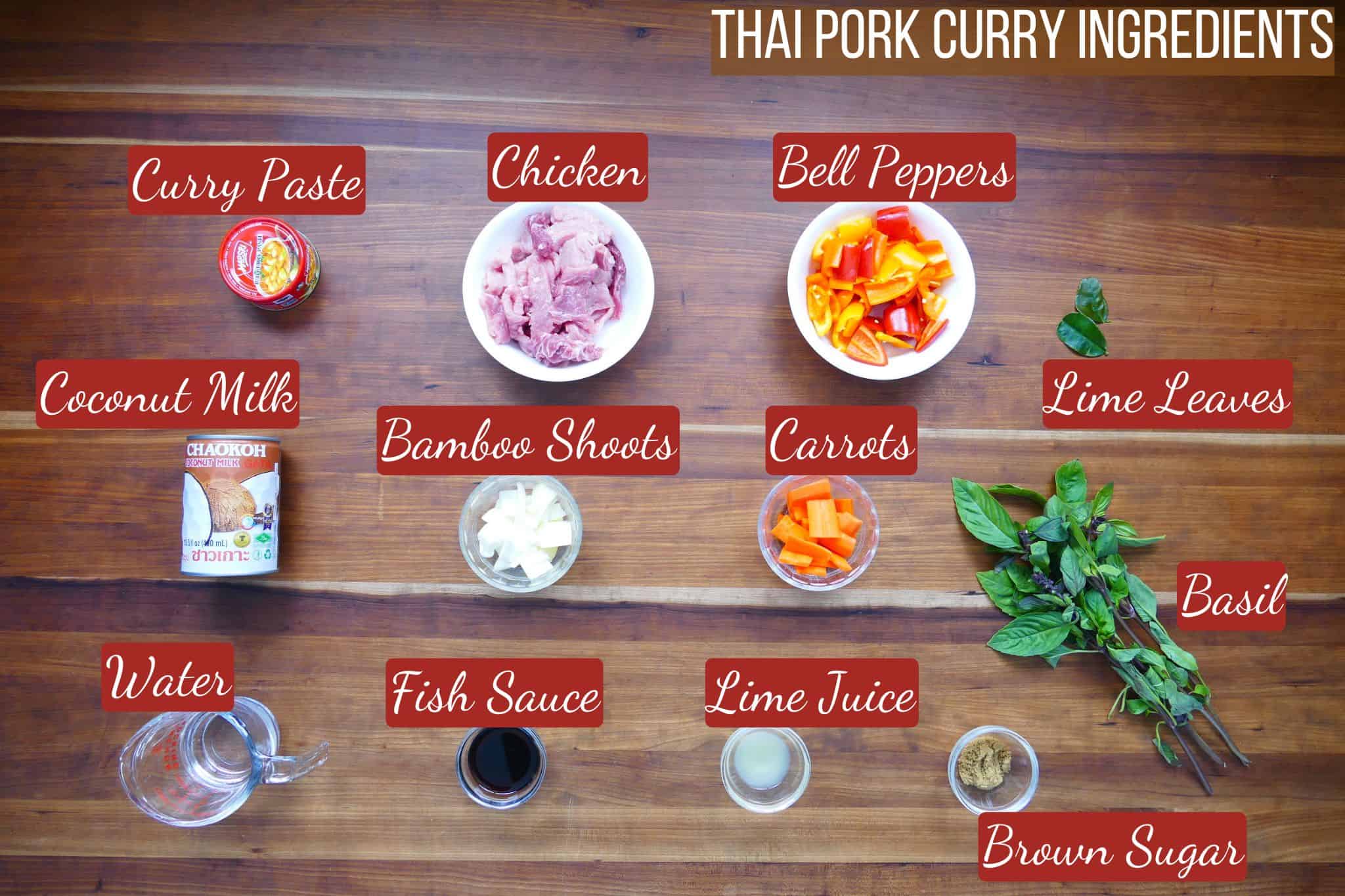 Thai Red Curry Ingredients on wooden counter.